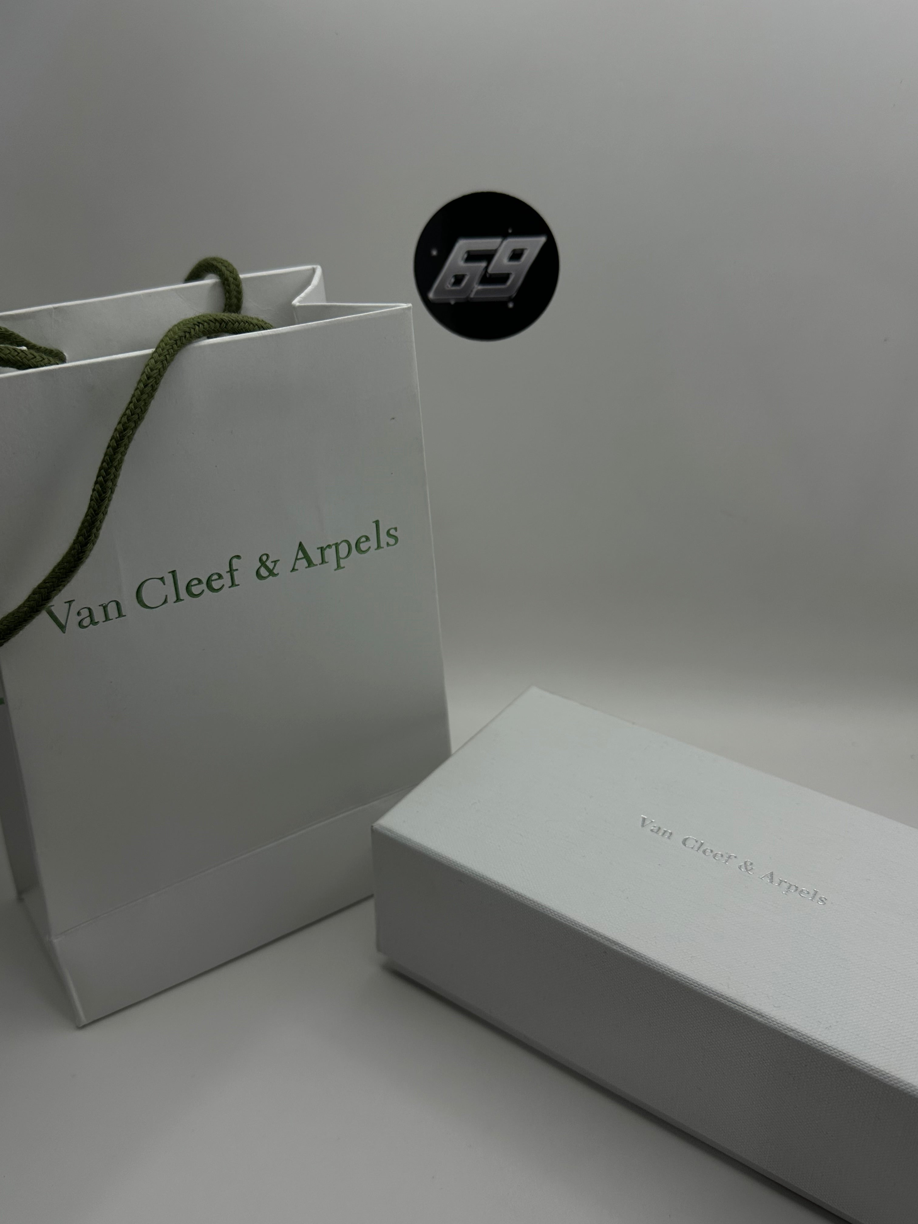 Van Cleef Oro/Vino